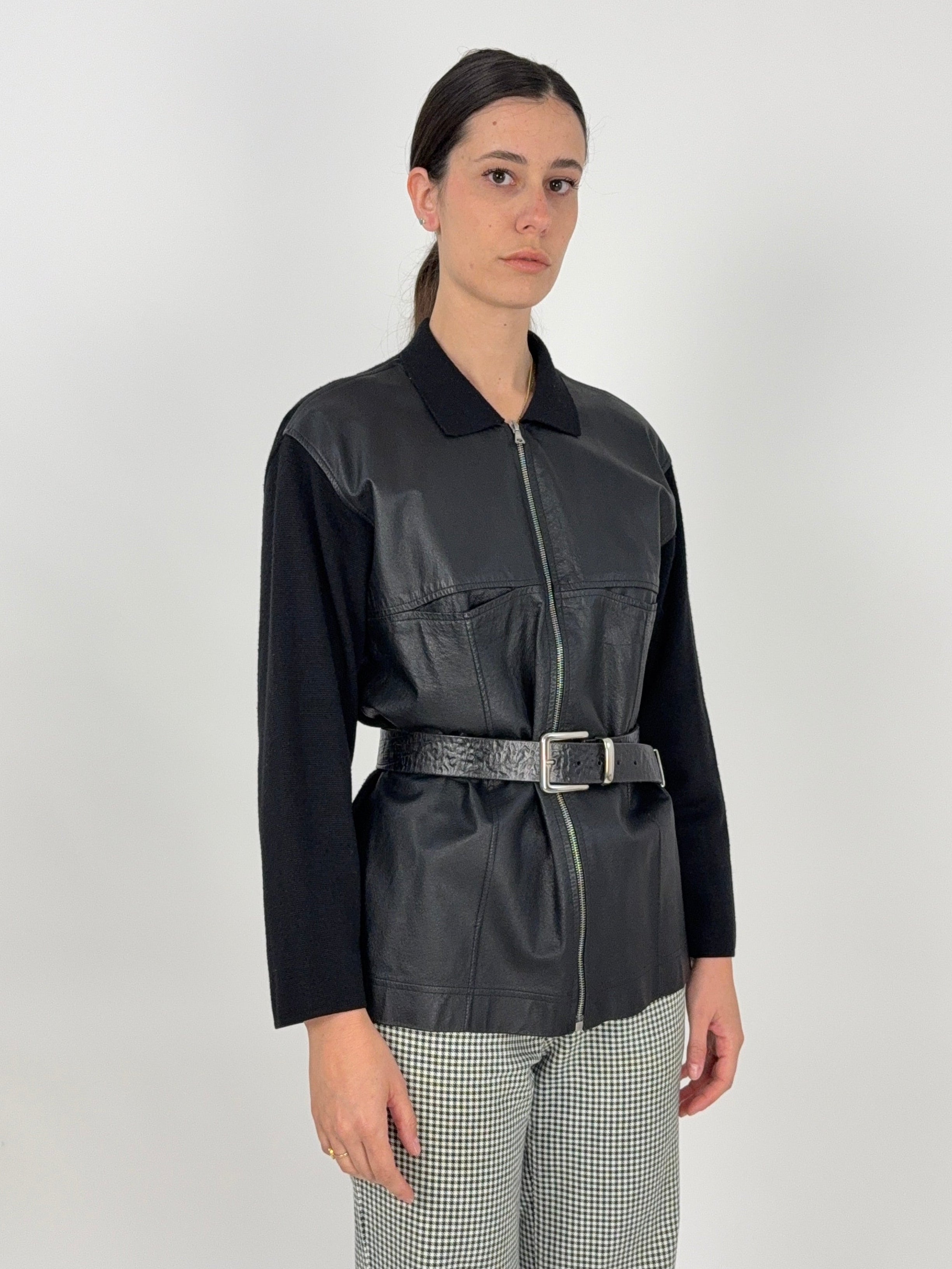 giacca in maglia e pelle nera anni '80 da donna