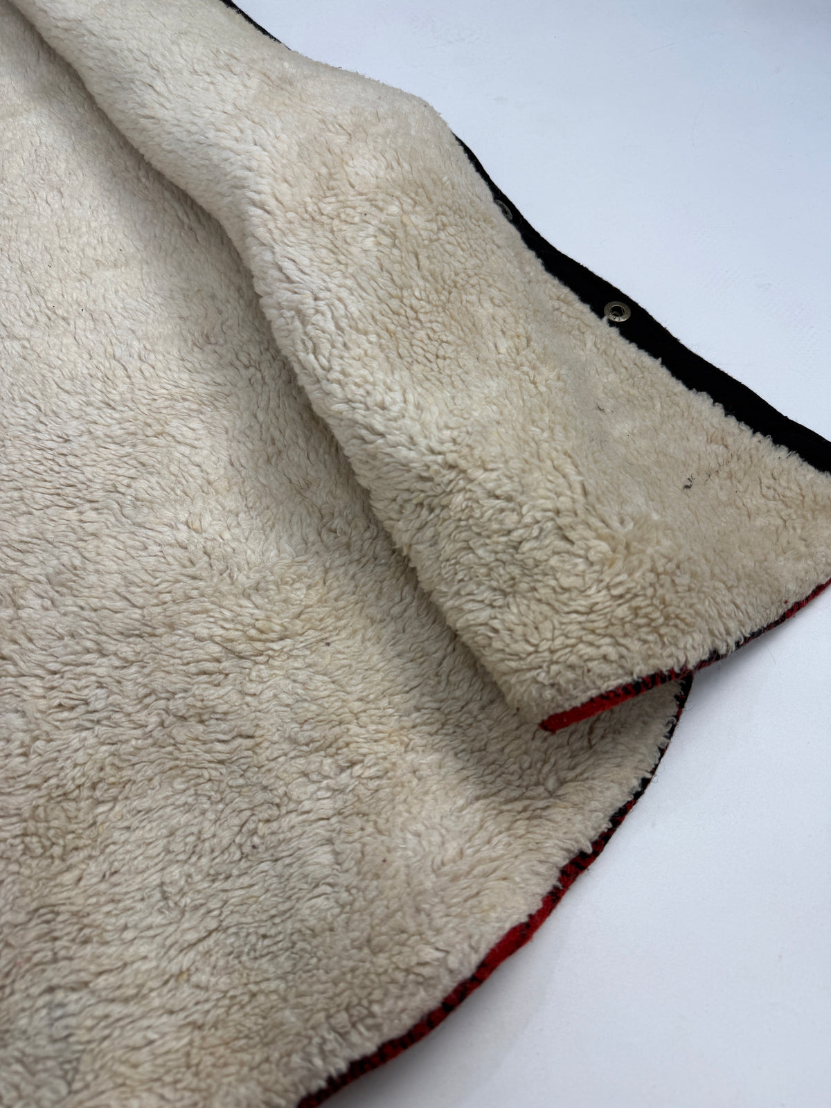 Dettaglio fodera sherpa crema interna gilet Paragraff - texture e stato di conservazione
