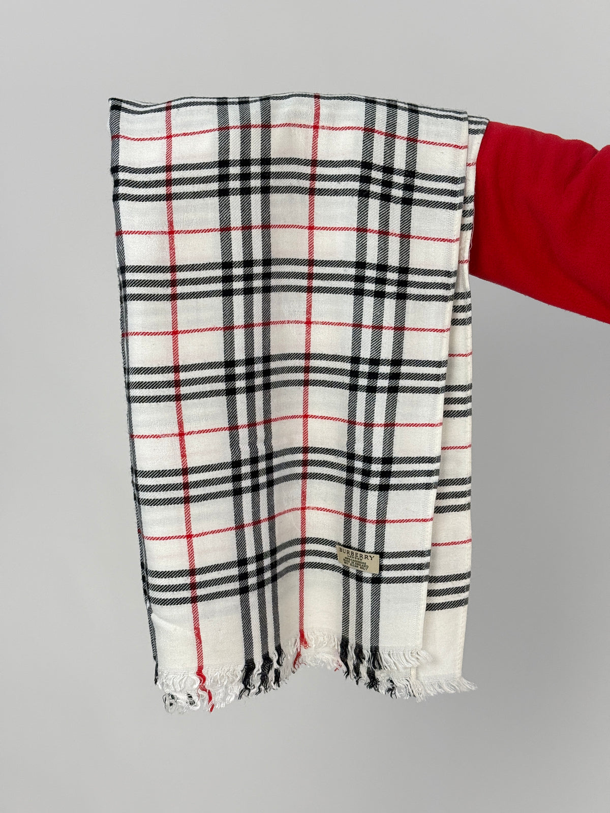 Sciarpa stola Burberry distesa con frange alle estremità