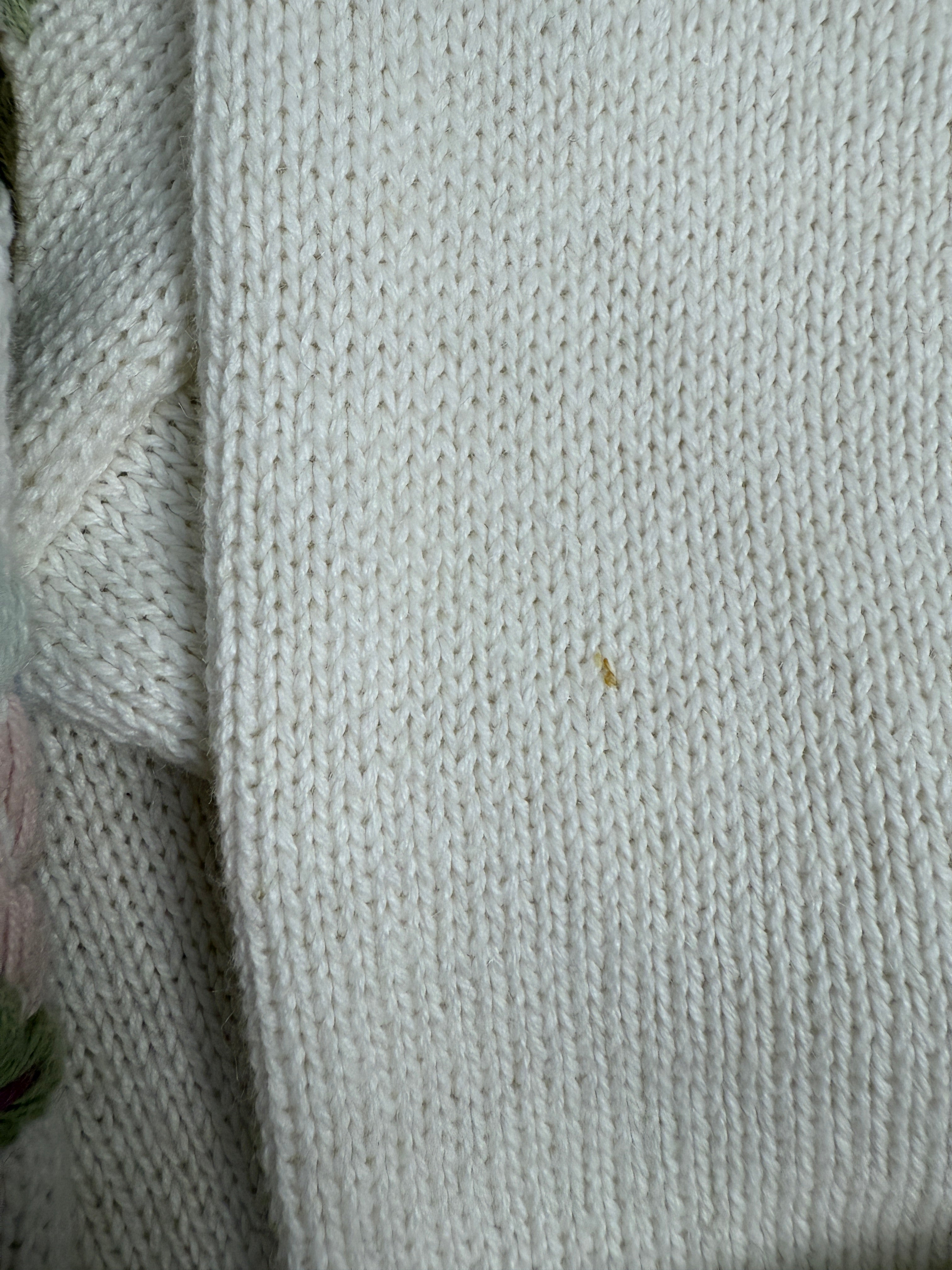 Cardigan con ricami floreali