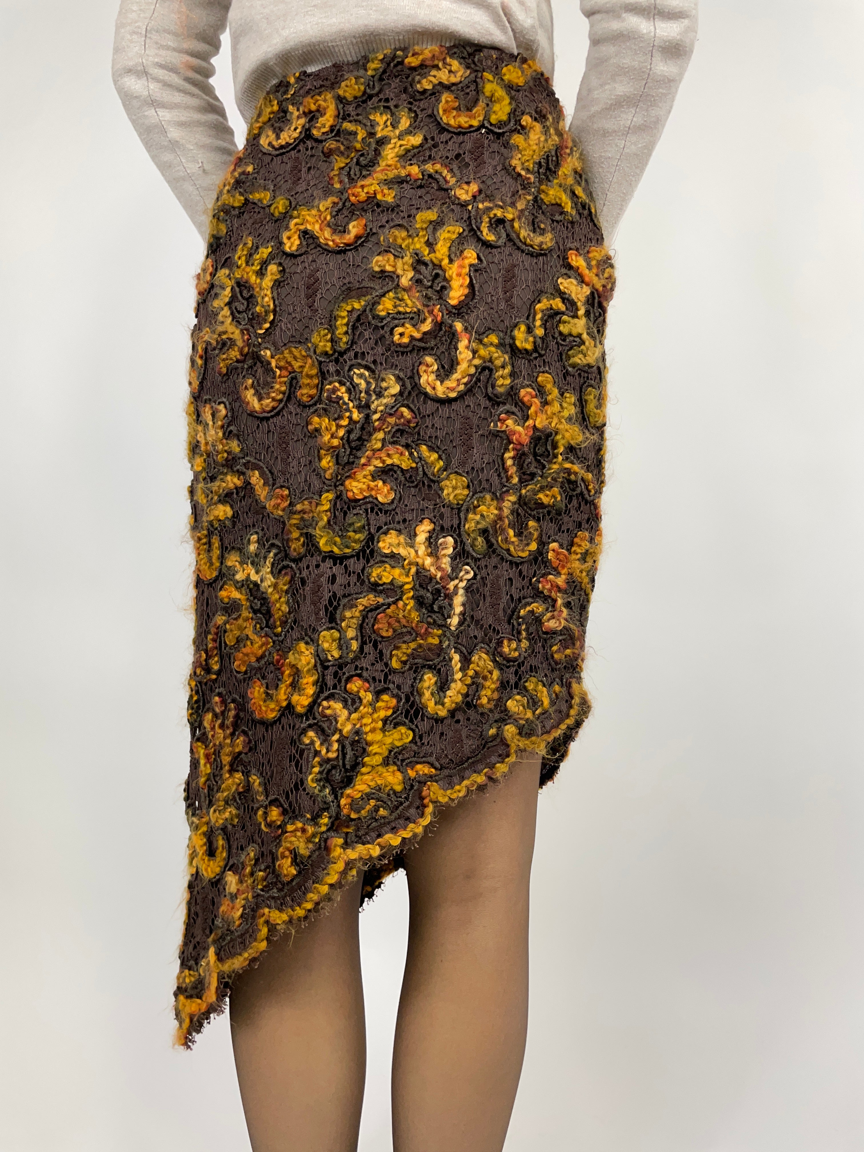 Asymmetrical skirt in worked lace