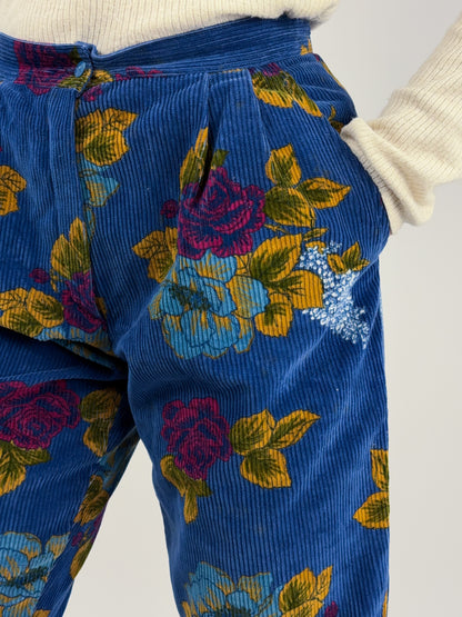 Pantaloni in velluto a coste con stampa floreale