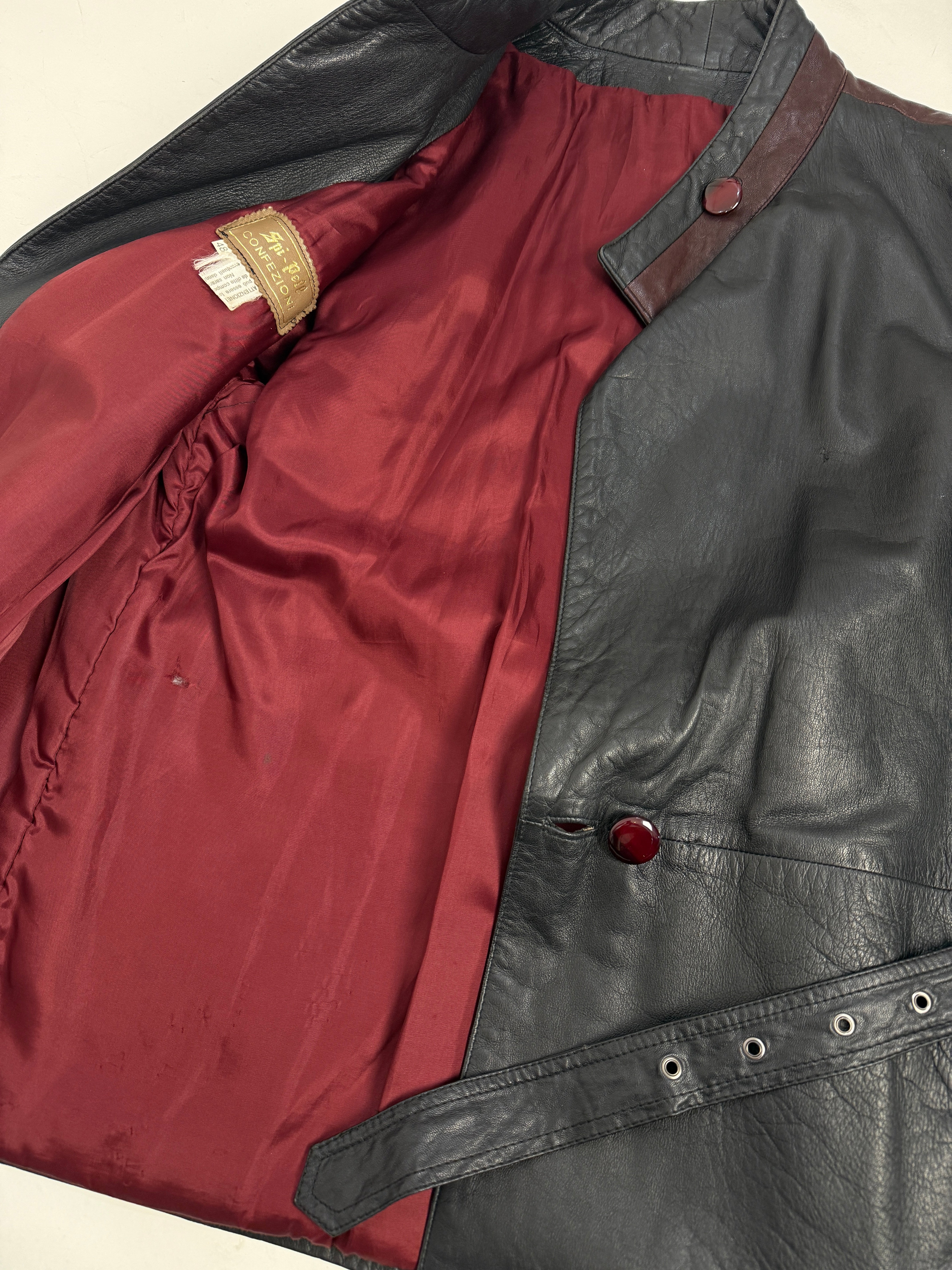 Giacca vintage in pelle nera con rifiniture prugna