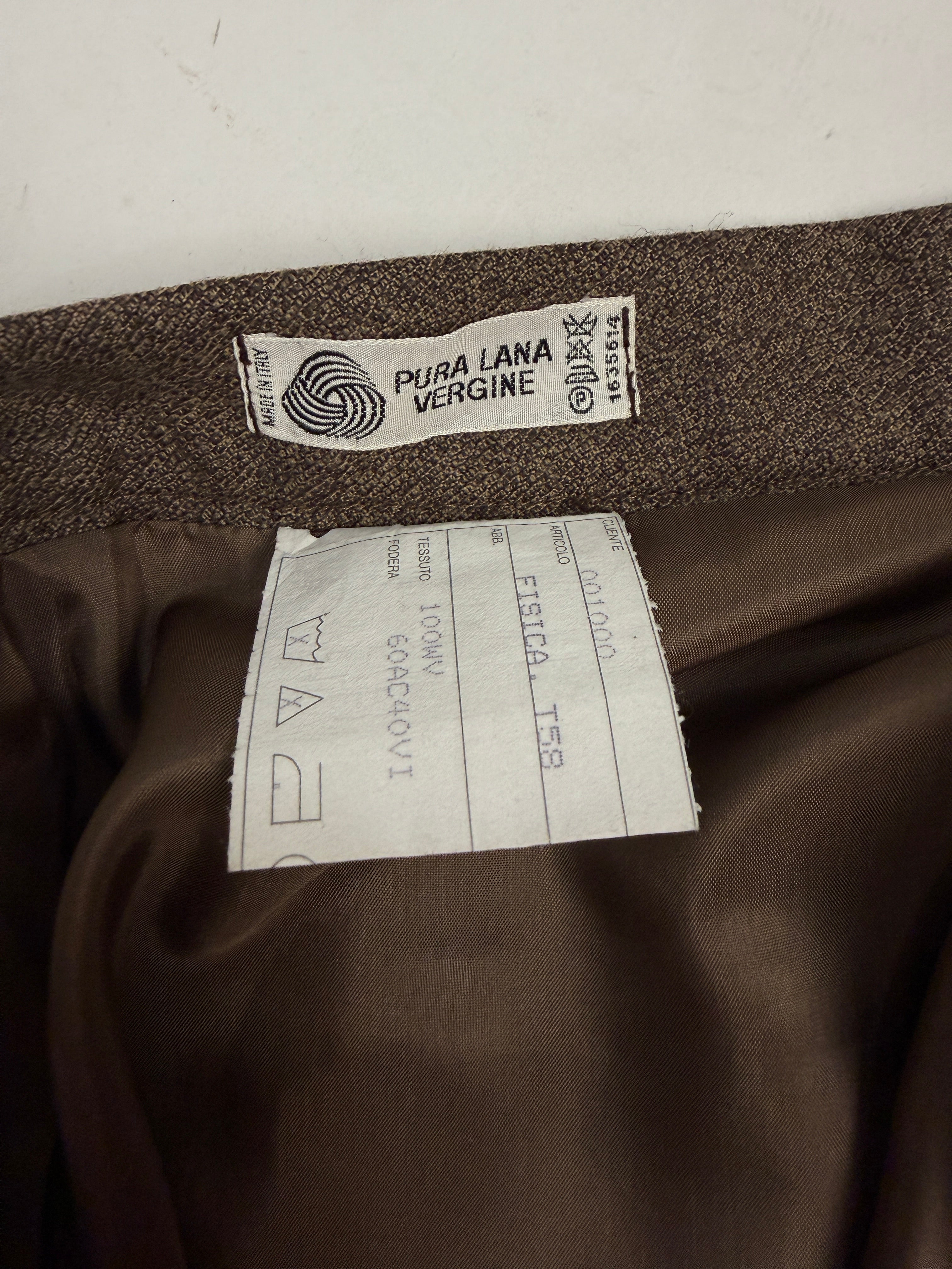 Dettaglio etichetta Pura Lana Vergine Woolmark 100% Wool Made in Italy