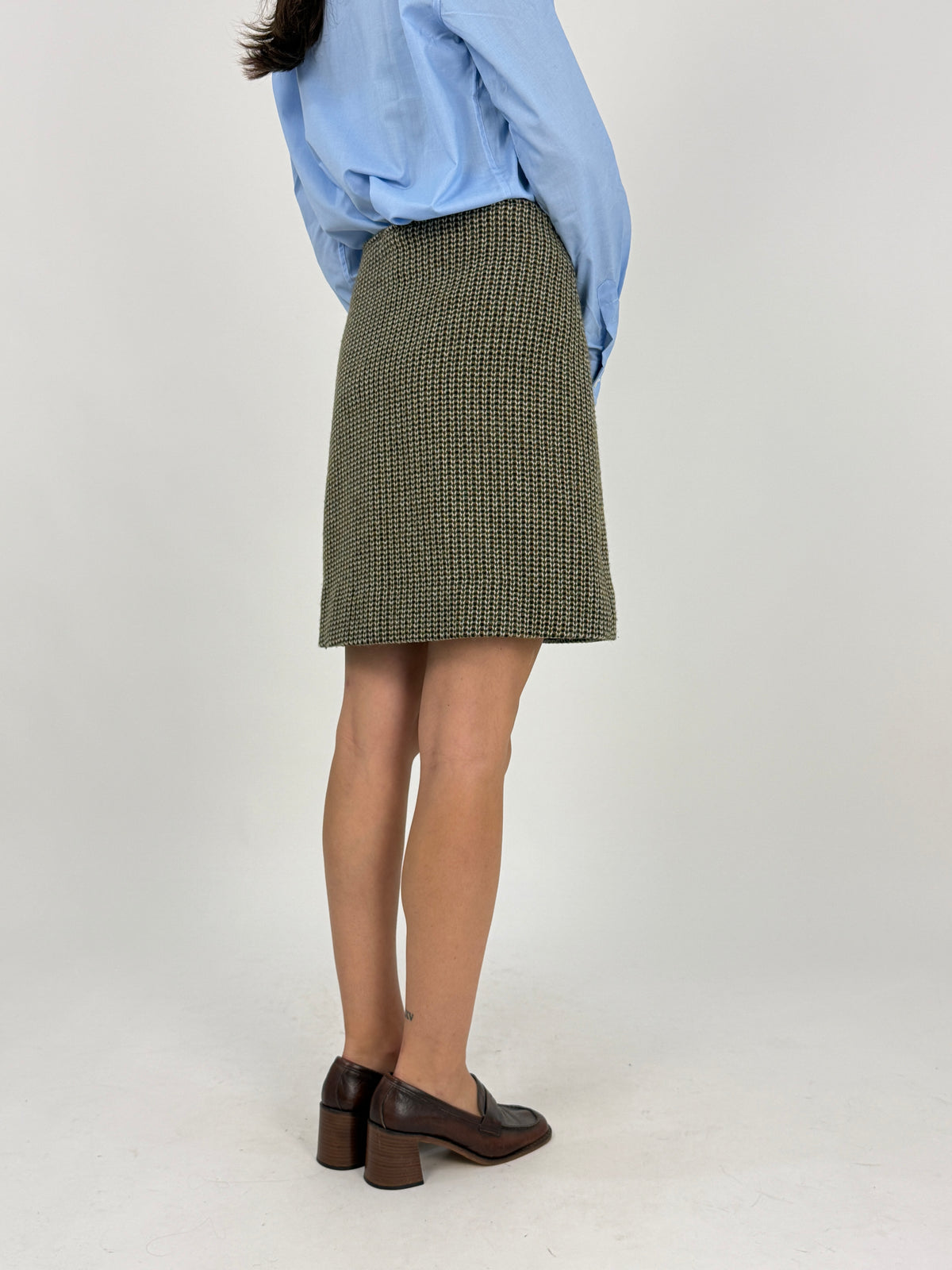 Dettaglio della trama tweed bouclé della gonna