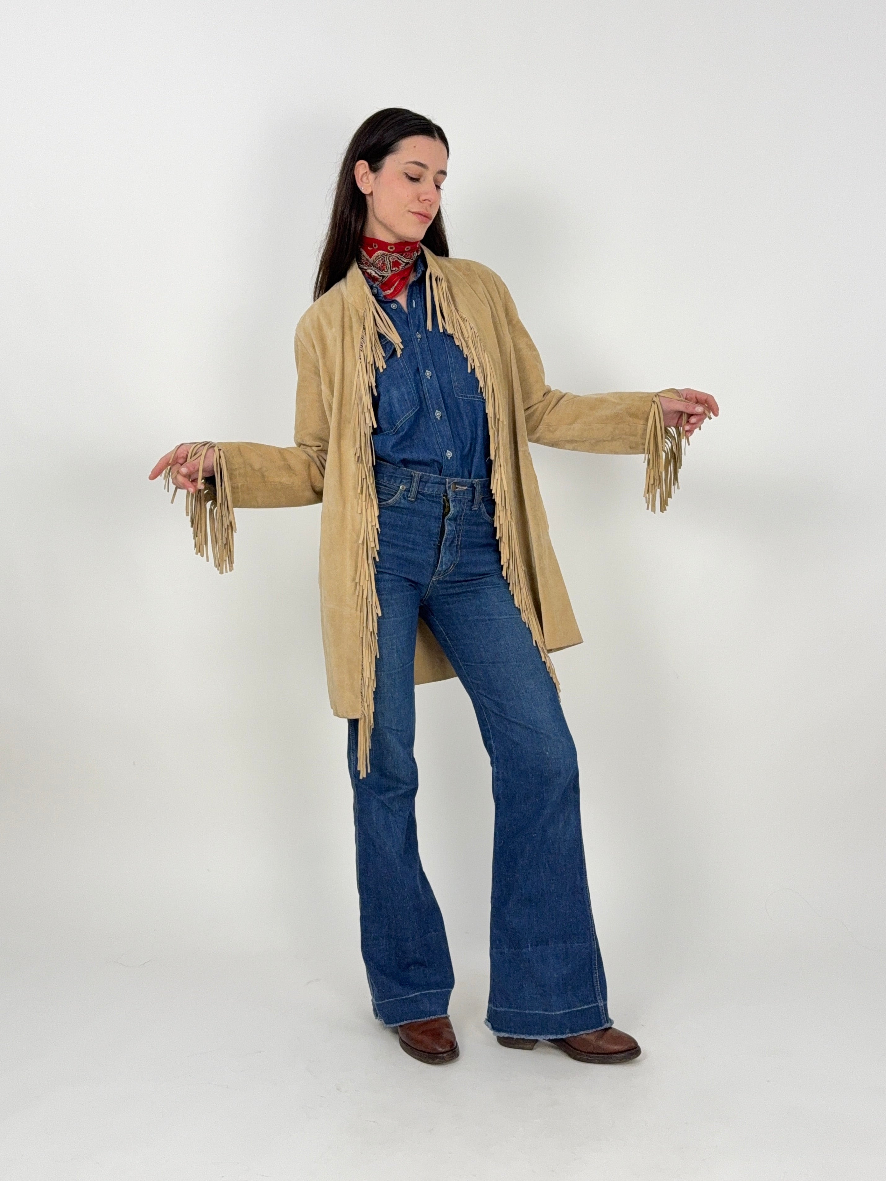Giacca vintage in pelle con frange beige western