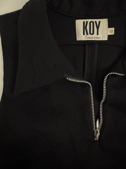 Abito nero smanicato con zip metalliche