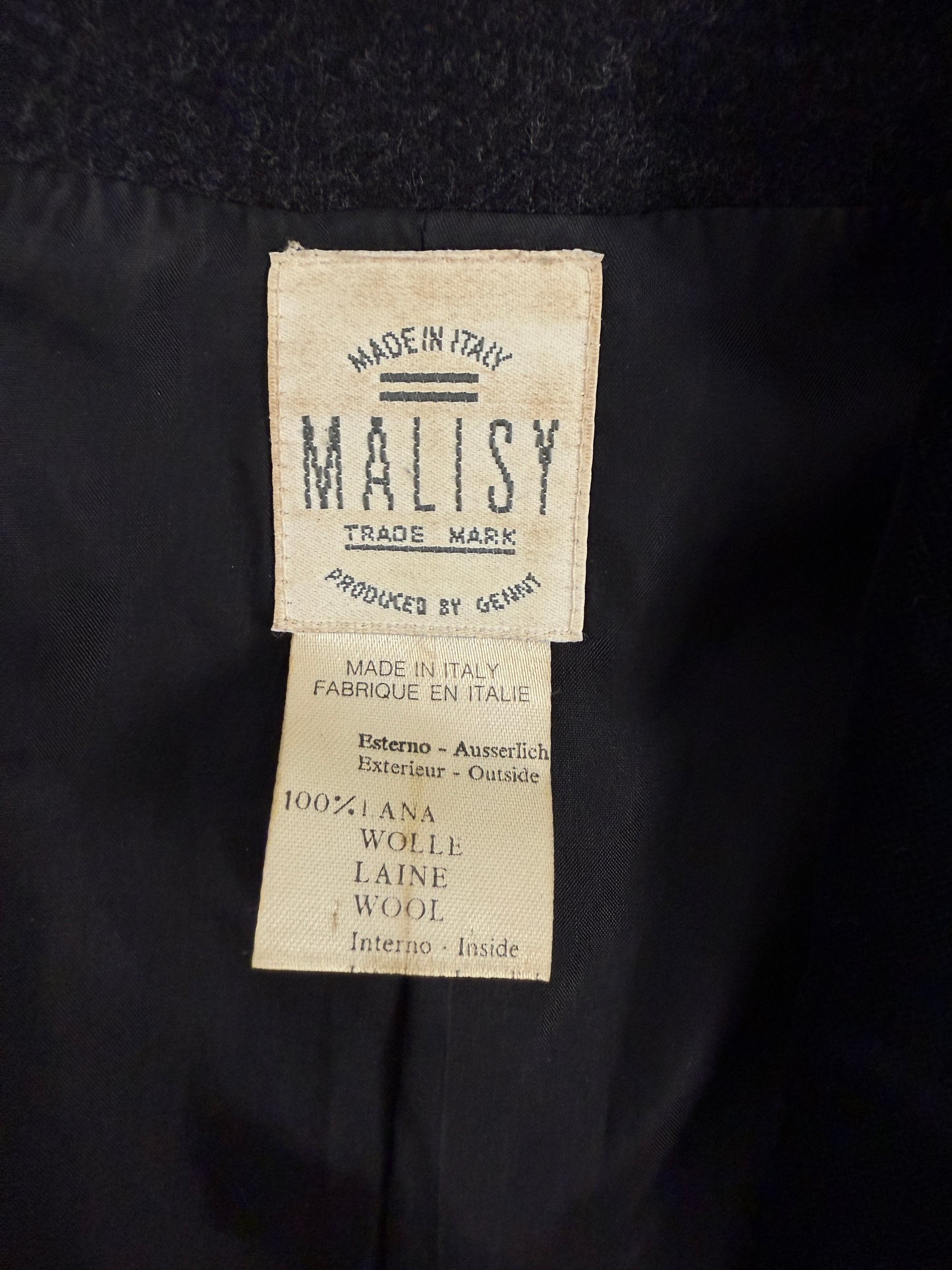 Giacca bolero sartoriale in lana con revers in velluto