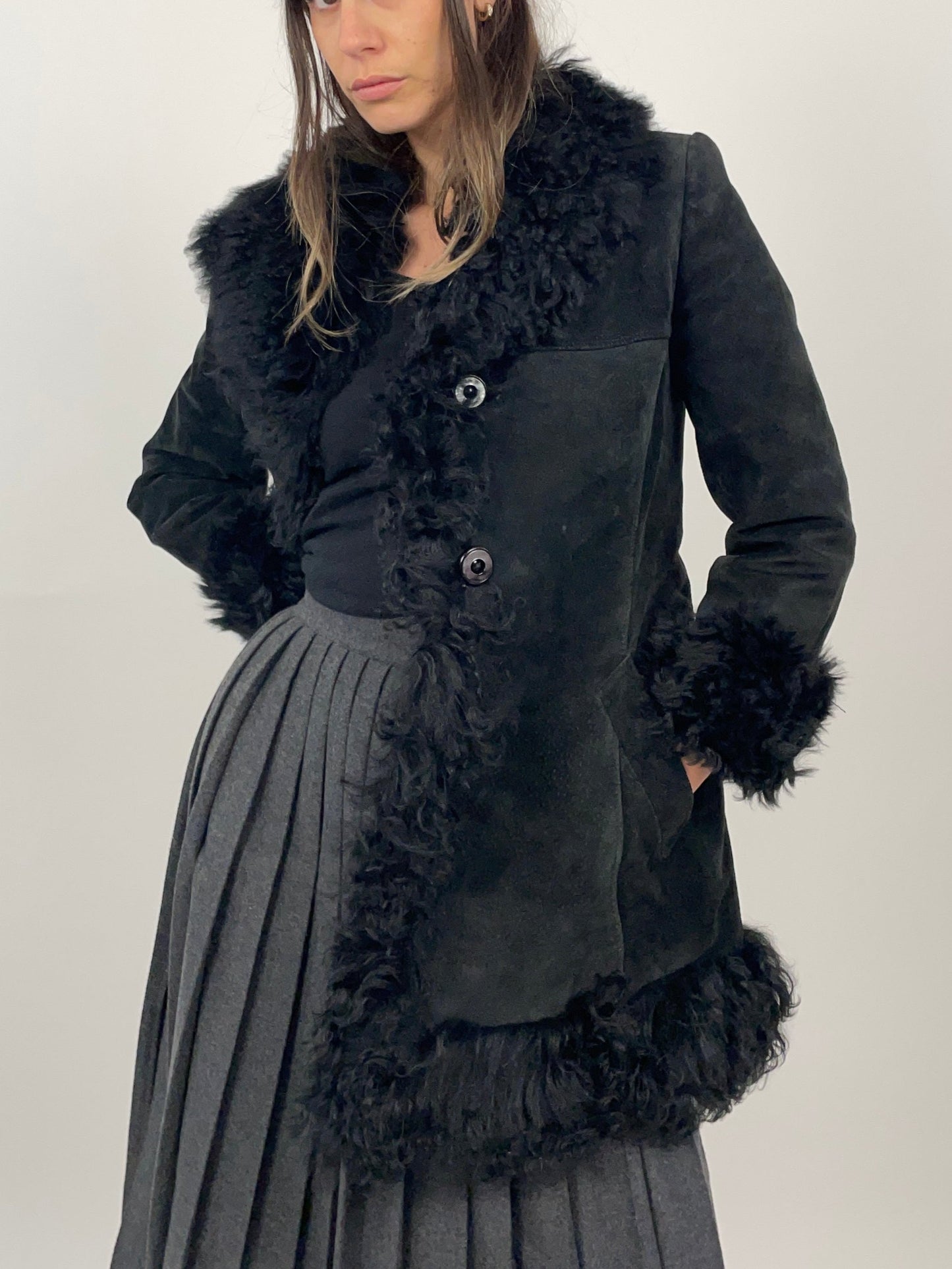 shearling-anni-70-nero-da-donna