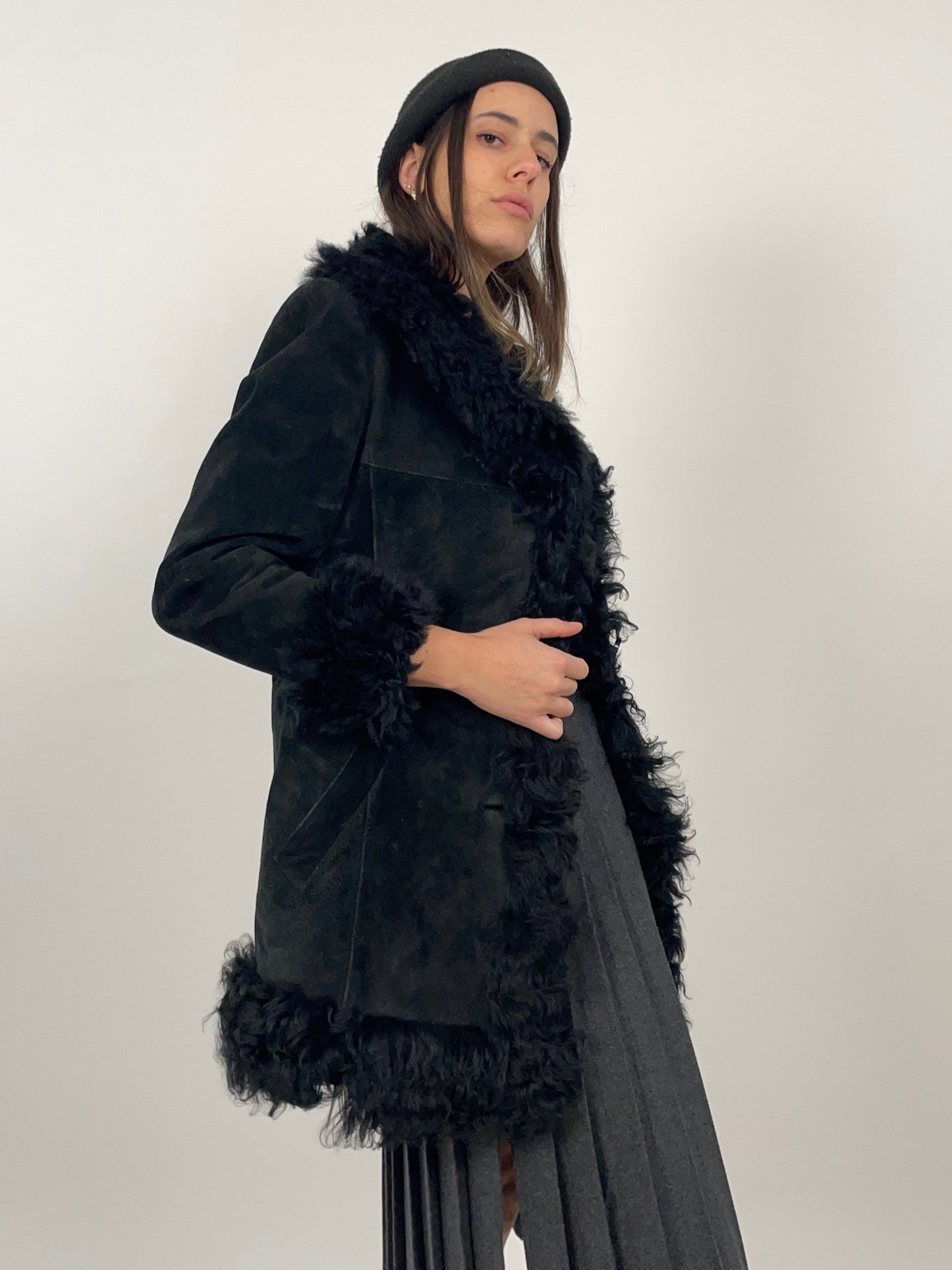 shearling-anni-70-nero-da-donna