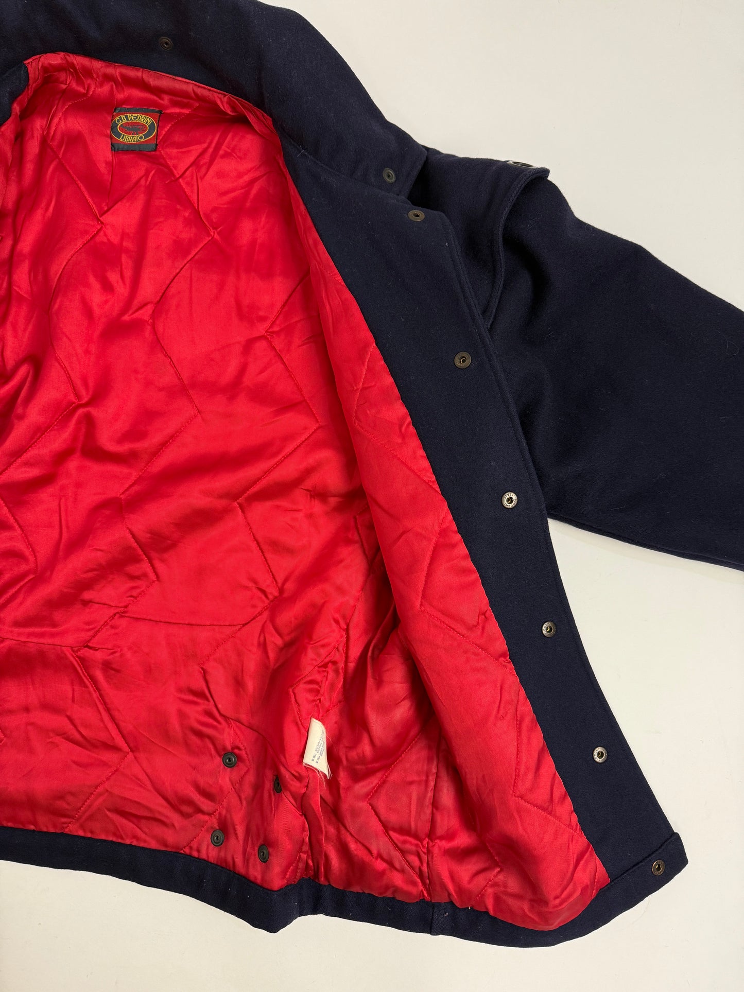 Cappotto anni '80 con interno trapuntato rosso