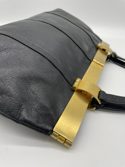 Nieri Argenti-Leather bag and gold plate